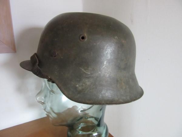 M42 Army Helmet with Battle damage and War Art